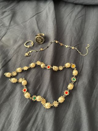 Conjunto de anillos, collar y pulsera