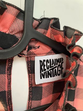 Vestito a quadri rosa e nero