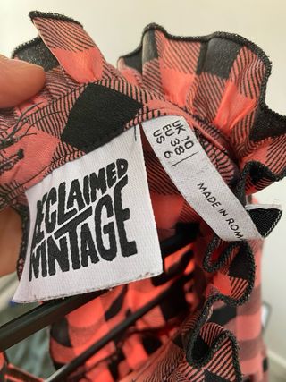 Vestito a quadri rosa e nero