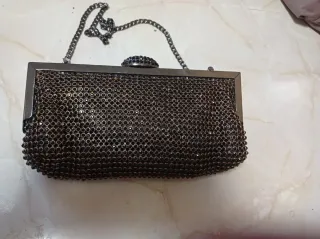 Bolso de fiesta negro y dorado