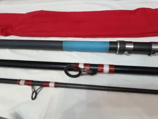 Caña de surf casting, carrete y accesorios