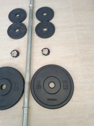 Barra y discos de pesas