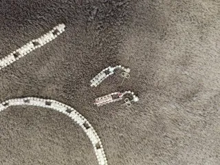 Conjunto collar, pulsera y pendientes brillantes