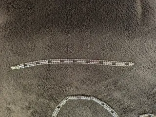 Conjunto collar, pulsera y pendientes brillantes