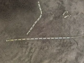 Conjunto collar, pulsera y pendientes brillantes