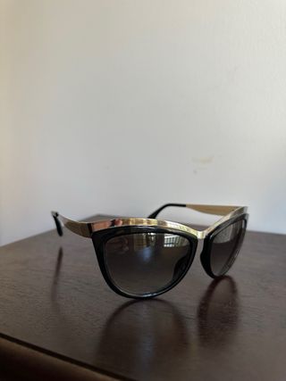 Occhiali da sole Alexander McQueen neri e oro