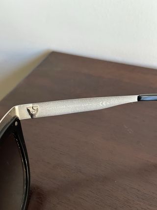 Occhiali da sole Alexander McQueen neri e oro