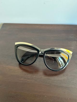 Occhiali da sole Alexander McQueen neri e oro