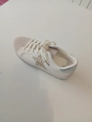 Zapatillas casuales con estrella dorada