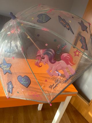 Paragüas infantil transparente con estrellas y uni