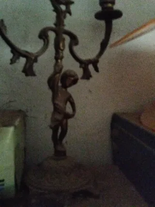 2 Candelabros antiguo de metal.