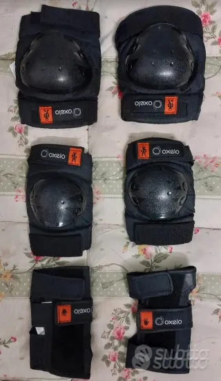 Pattini Oxelo rosa con accessori