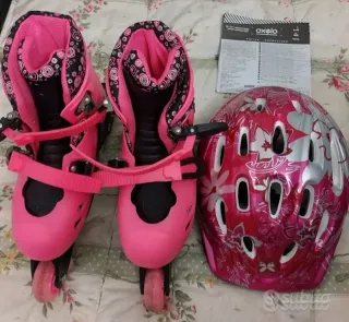 Pattini Oxelo rosa con accessori