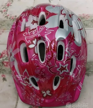 Pattini Oxelo rosa con accessori