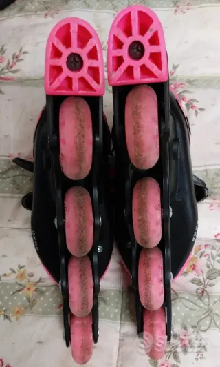 Pattini Oxelo rosa con accessori