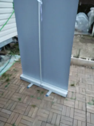 Expositor enrollable con bolsa