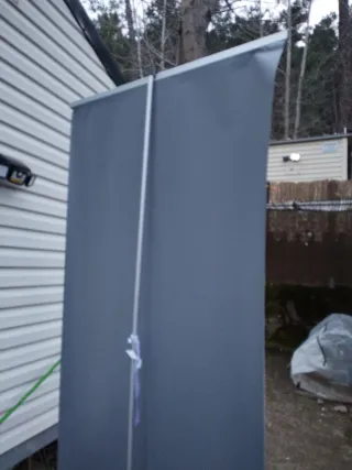 Expositor enrollable con bolsa