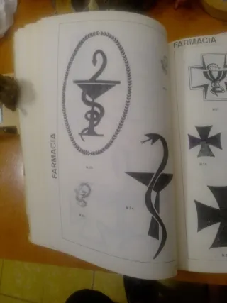 2 libros de muestras de dibujos p/alime y comercio