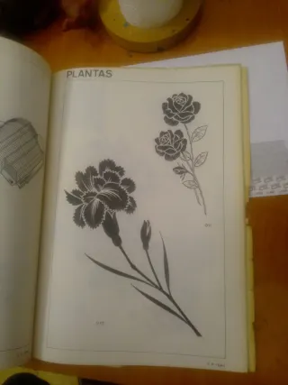 2 libros de muestras de dibujos p/alime y comercio