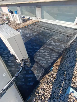 Oficial de telas asfáltica