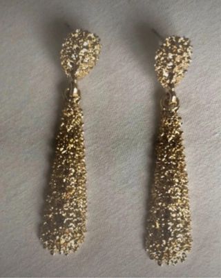 Pendientes dorados largos