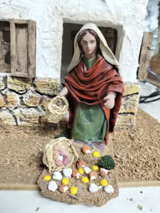 Pastora con cesta di uova