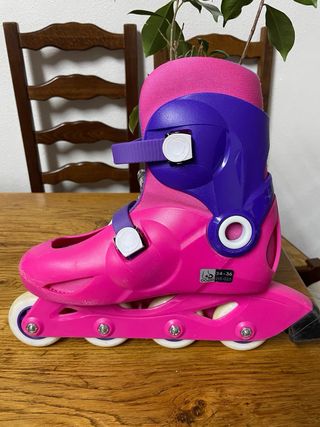 Patines infantiles rosas y morados talla 34-36.