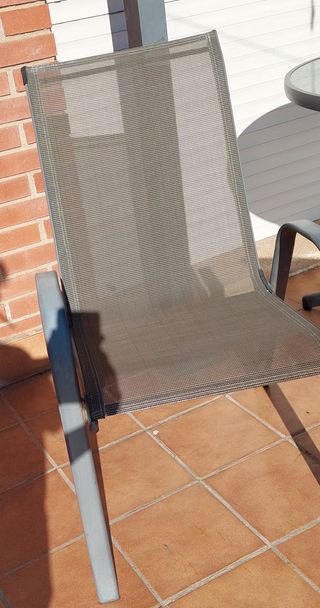 Mesa y 4 sillas de jardín de acero y cristal