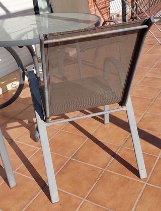 Mesa y 4 sillas de jardín de acero y cristal