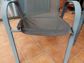 Mesa de jardín de metal y cristal