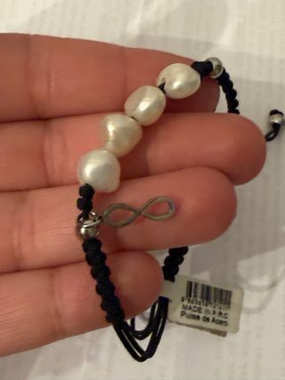 Pulsera de perlas y acero con símbolo infinito