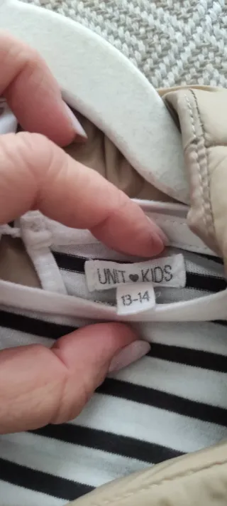 Conjunto chaleco acolchado y camiseta rayas mujer