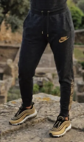 Pantalón Nike Negro y Dorado Talla XS