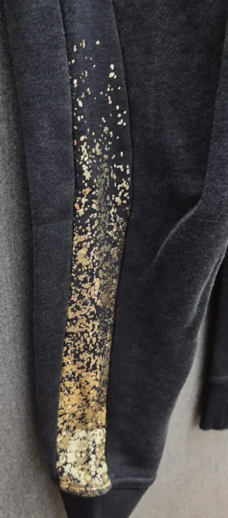 Pantalón Nike Negro y Dorado Talla XS