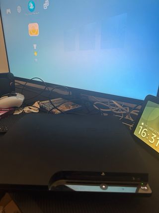 PlayStation 3 Slim con controller e videocamera