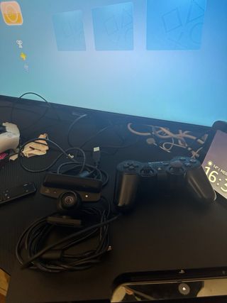 PlayStation 3 Slim con controller e videocamera