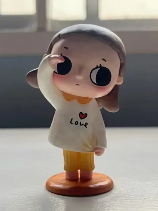 Figura Nyota niña con corazón