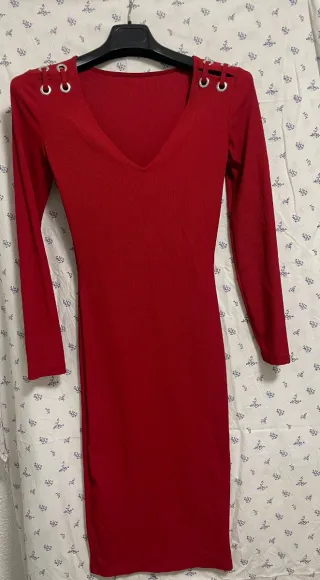 Vestido blanco con volantes y lazada