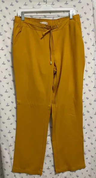 Vestido blanco con volantes y lazada