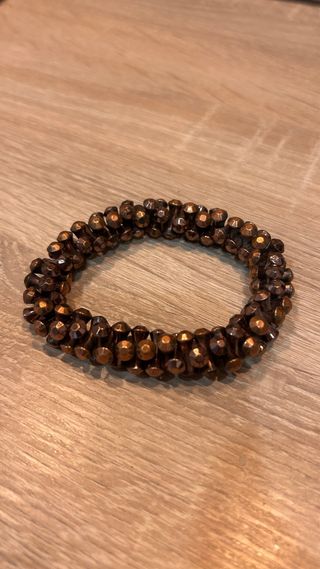 Pulsera elástica cuentas marrones y doradas