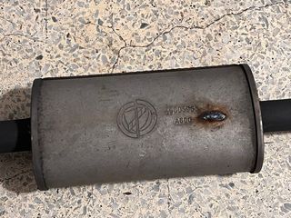 Catalizador y silenciador intermedio