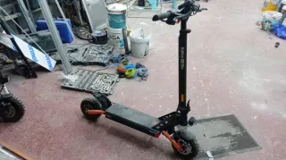 Patín Eléctrico Naranja y Negro