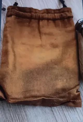 Prismáticos antiguos con funda