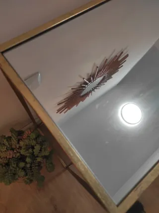Consola dorada como desgastada