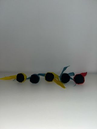 Diana de juguete con dardos