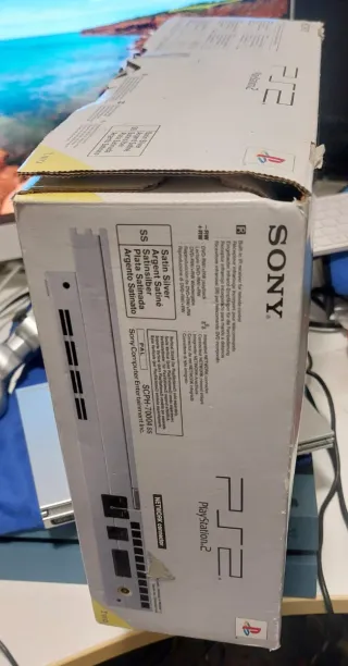 PlayStation 2 Slim Plata