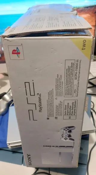 PlayStation 2 Slim Plata