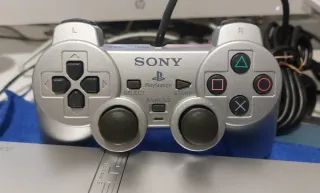 PlayStation 2 Slim Plata