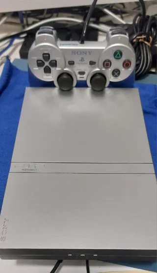 PlayStation 2 Slim Plata