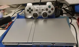 PlayStation 2 Slim Plata